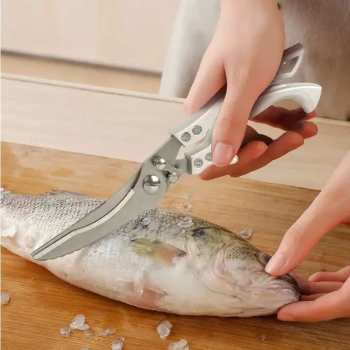 Ergonomic stainless steel poultry shears, ideal for cutting chicken, herbs, and opening food packages.