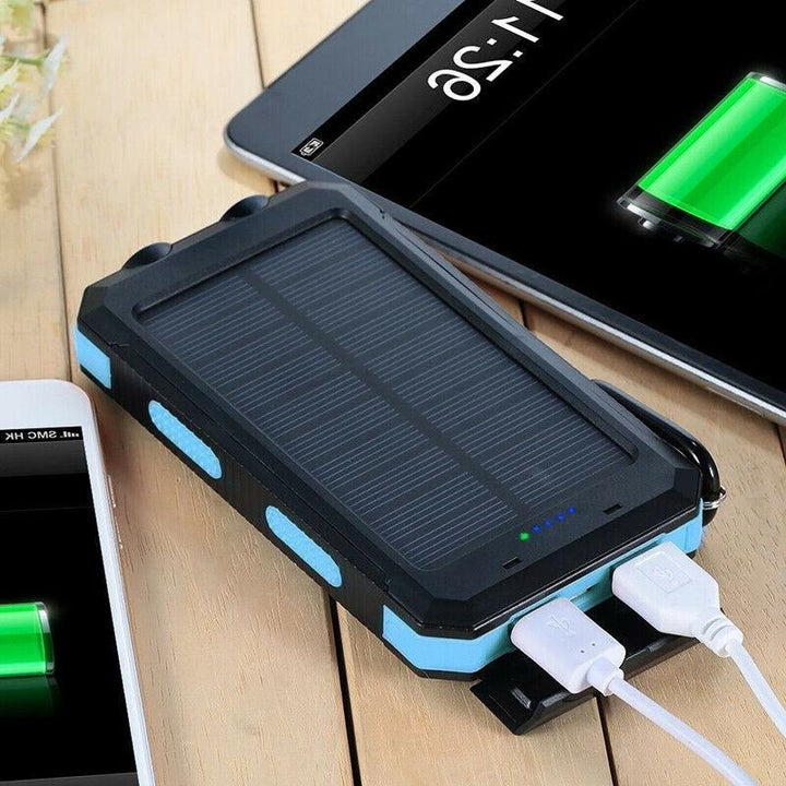 "High-capacity waterproof dual USB solar charger with LED lights; 500,000mAh power bank; compact; for outdoor use."