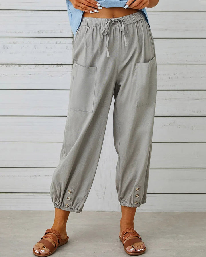 Stylish women's wide-leg pants with a high waist for versatile everyday wear. Ideal for summer fashion & comfort.