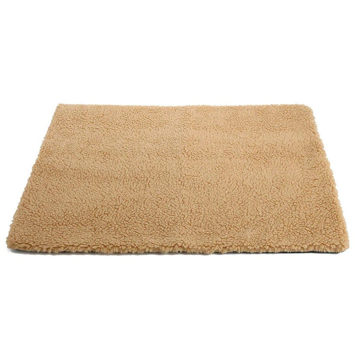 Cozy self-warming pet mat for cat or dog. Non-electric, washable heating pad provides comforting warmth.