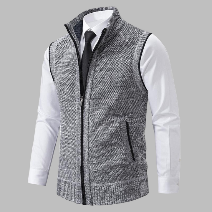 Knitted zip-up men's vest, a versatile layering piece for fall and winter smart casual outfits.