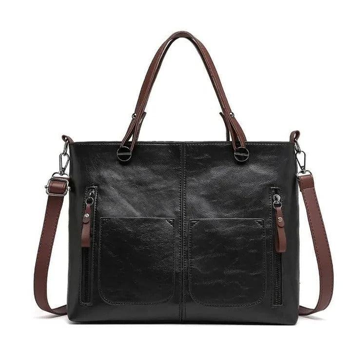 Versatile leather tote bag for women, can be worn as shoulder or crossbody, ideal for travel & daily use.