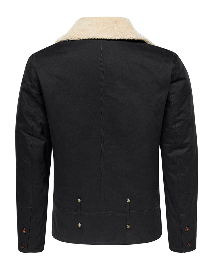 Three rugged aviator canvas jackets for men in khaki, black, and army green