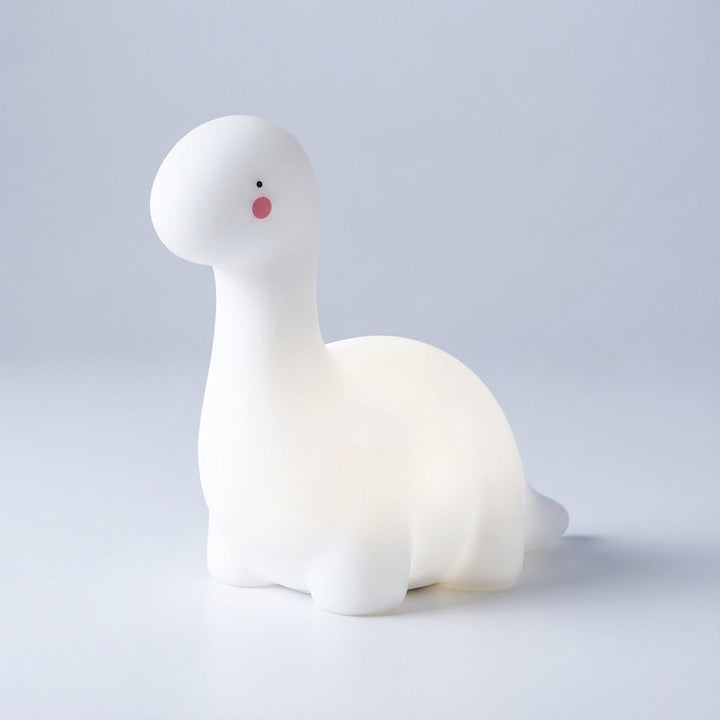 Versatile Kids' Animal LED night light, a cute Dreamasaur bedside lamp perfect for nursery decor and gentle glow.