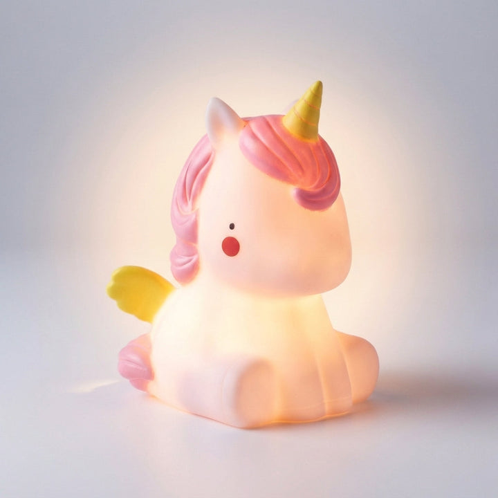 Cute animal-shaped LED night light, Dreamasaur lamp provides a gentle, soothing glow for children's restful sleep.