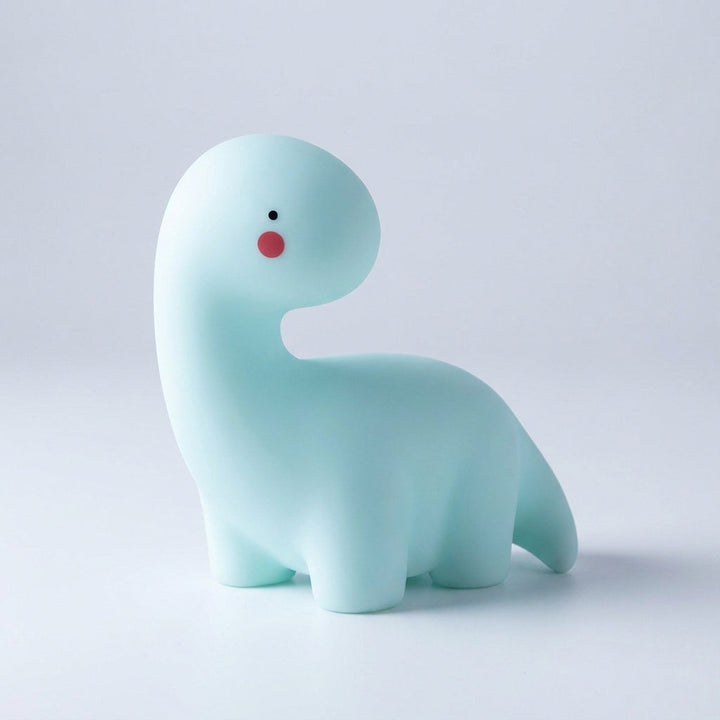 Adorable dinosaur, ghost, or unicorn LED night light for kids. A soothing animal-shaped bedside lamp with gentle glow.