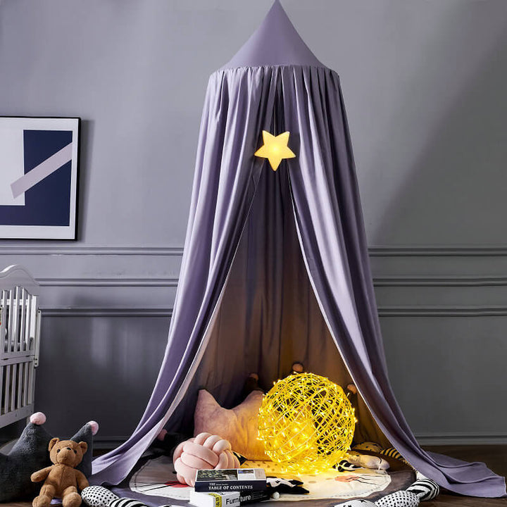 Soft, vibrant kids bed canopy, creating a dreamy atmosphere for a nursery or bedroom.