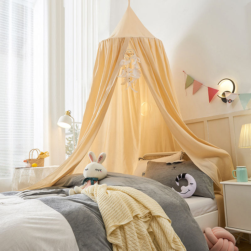 Imaginative kids canopy transforms a child's room into a magical, private play or sleep zone.