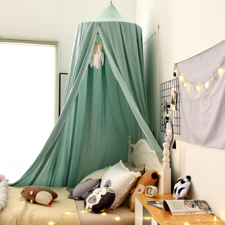 Soft nursery decor: a dreamy hanging canopy, perfect for a baby's or toddler's room.