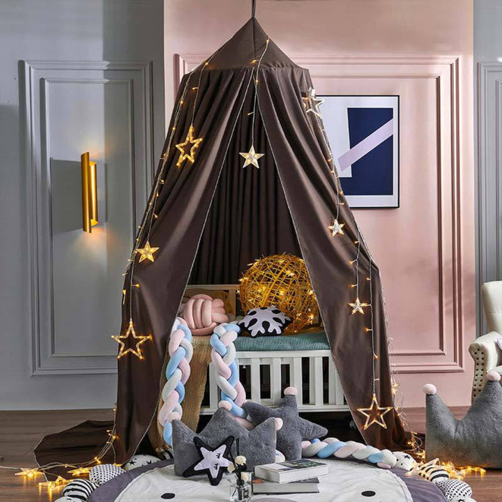 Versatile hanging canopy for children's room, suitable as a bed tent or imaginative play area.