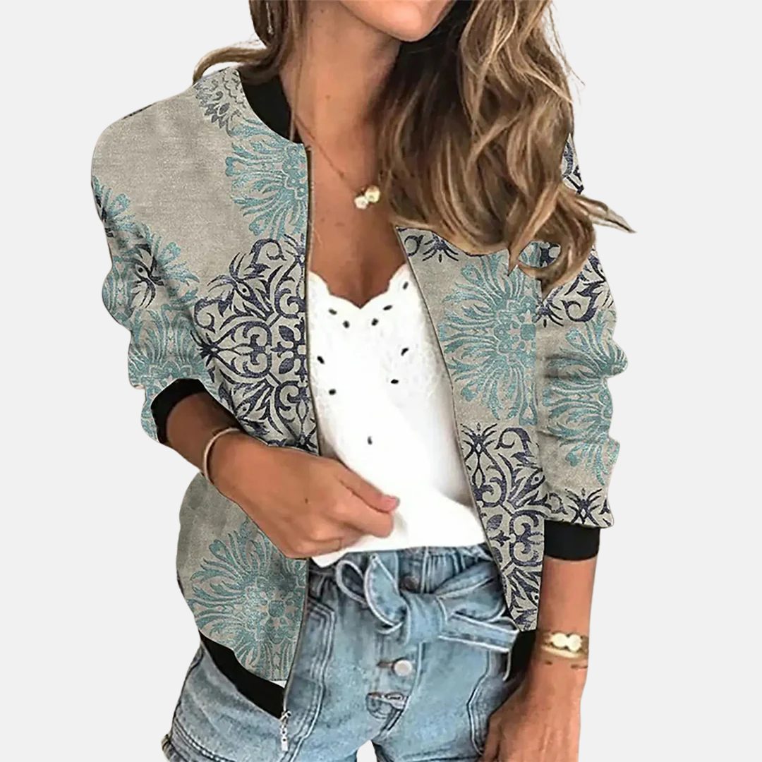 Vintage-inspired women's printed bomber jacket, a stylish retro statement piece for transitional fashion outerwear.