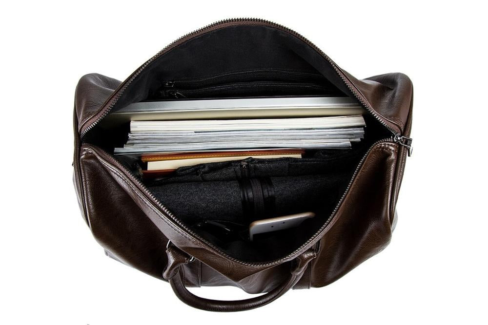 Lightweight faux leather weekend travel bag, spacious brown duffel for unisex adventures.