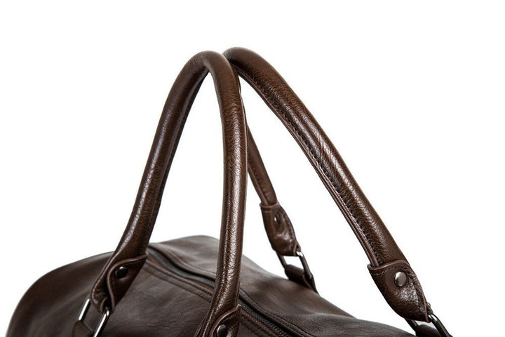Unisex large lightweight duffel, sleek black faux leather, versatile for gym, travel, or weekend.