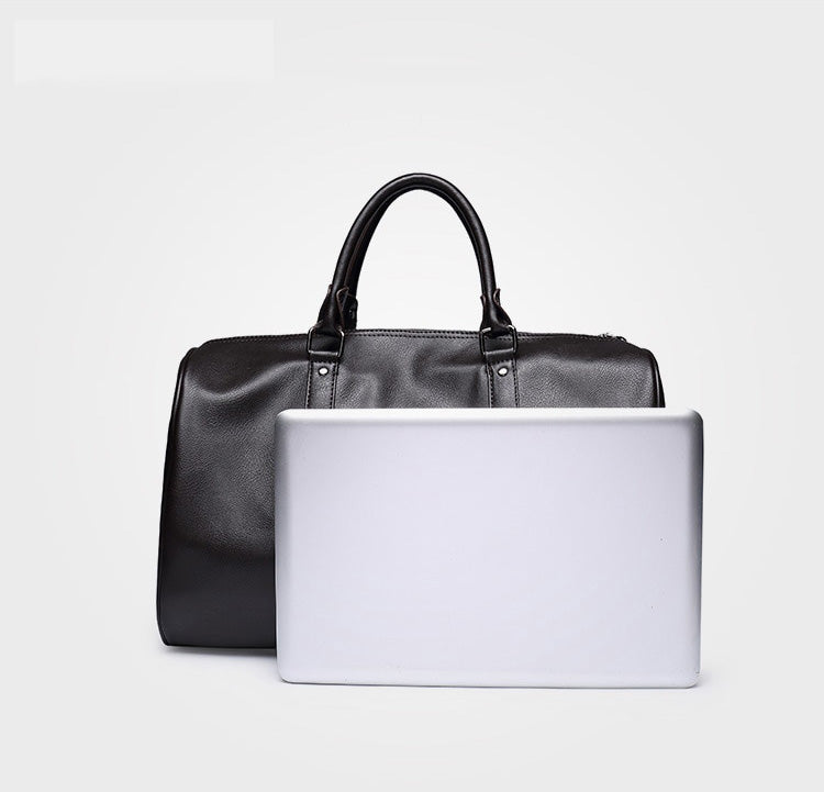 Lightweight carry-on duffel bag in faux leather, ideal for unisex travel, gym, or overnight stays.