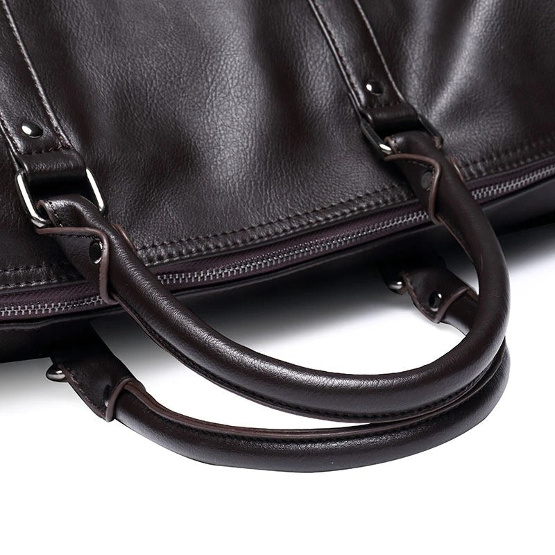 Brown faux leather gym bag, spacious and lightweight, versatile unisex travel duffel.
