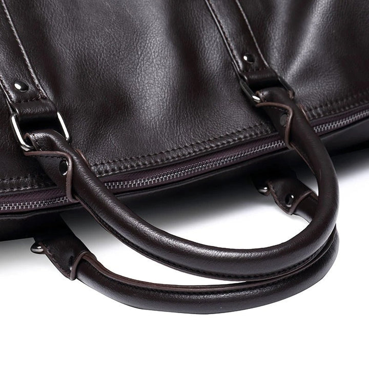 Brown faux leather gym bag, spacious and lightweight, versatile unisex travel duffel.