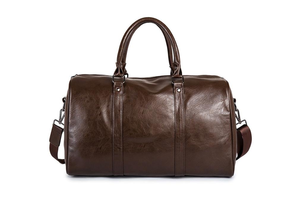 Travel-ready large faux leather duffel, lightweight design, great for unisex weekend getaways.