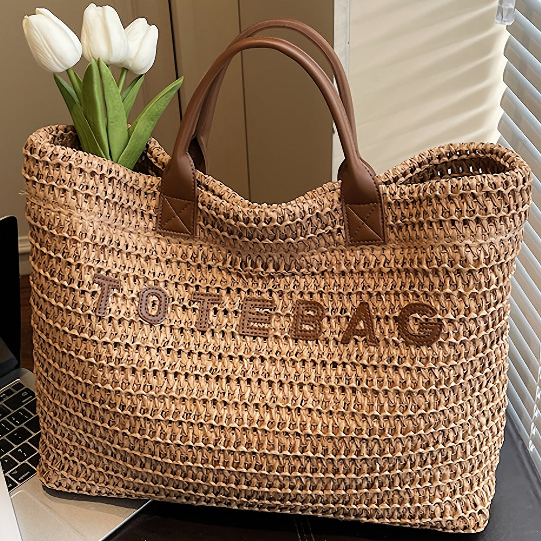 Large woven tote bag for women with elegant leather handles, perfect for everyday use.