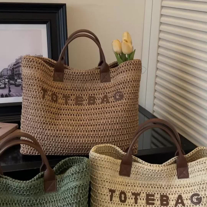 Everyday women's large woven handbag with contrasting leather handles, a practical choice.