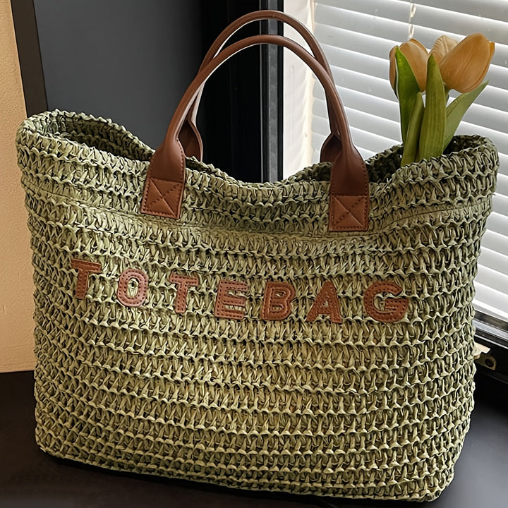 Casual chic large woven tote bag for women, ideal travel companion with leather straps.