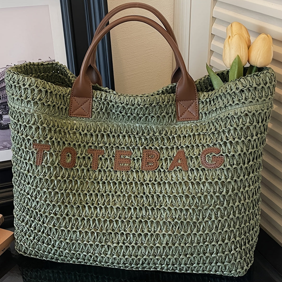 Spacious women's woven handbag with genuine leather handles, a versatile everyday accessory.