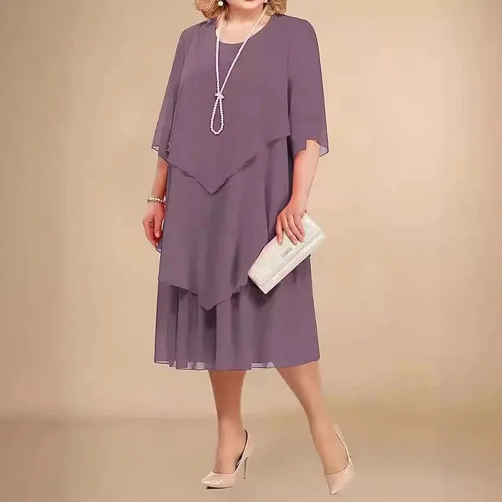 Purple A-Line midi dress for women, offering effortless elegance. Features a comfortable round neck & 3/4 sleeves.