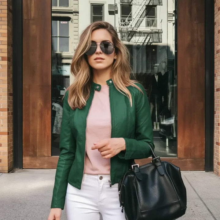 Elegant women's zip-up jacket. Collarless style offers a modern, versatile layering piece for fashion.