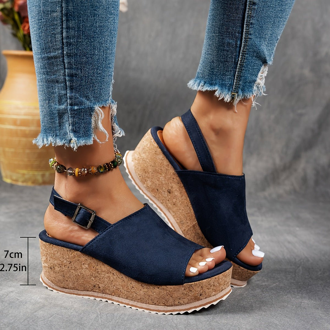Women's peep toe platform sandals with chic leopard print and adjustable buckle strap for a secure fit.