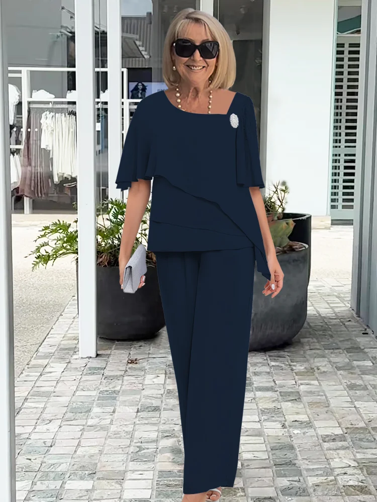 Elegant navy blue women's two-piece set with matching top & pants. Ideal for travel or cozy everyday wear.