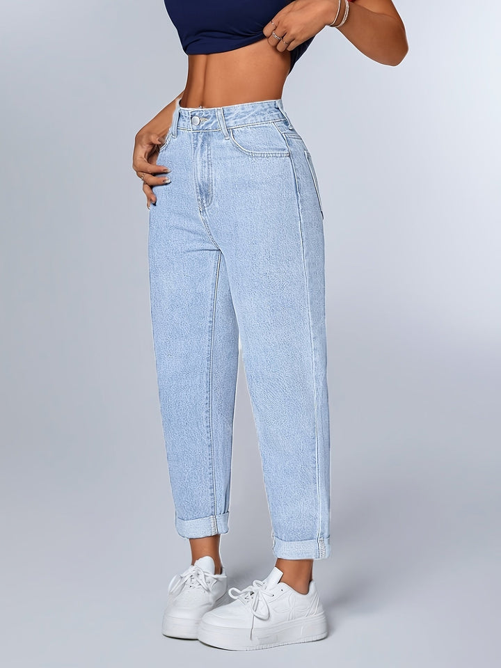 Light blue women's high-waist relaxed mom jeans with cuffed hem, perfect for casual retro style.