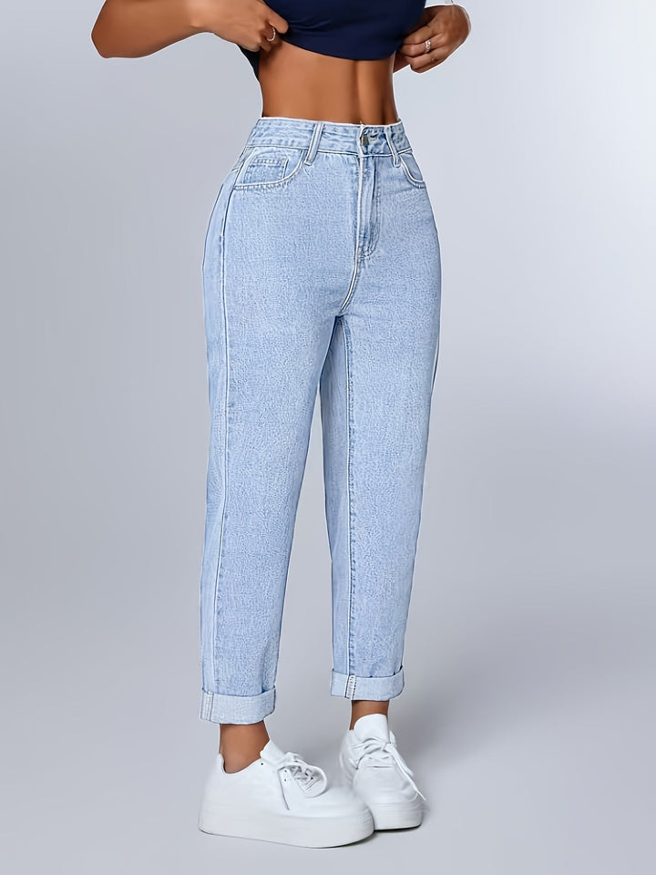 Everyday retro-style women's light blue mom jeans, high-waisted, relaxed fit, and cuffed.