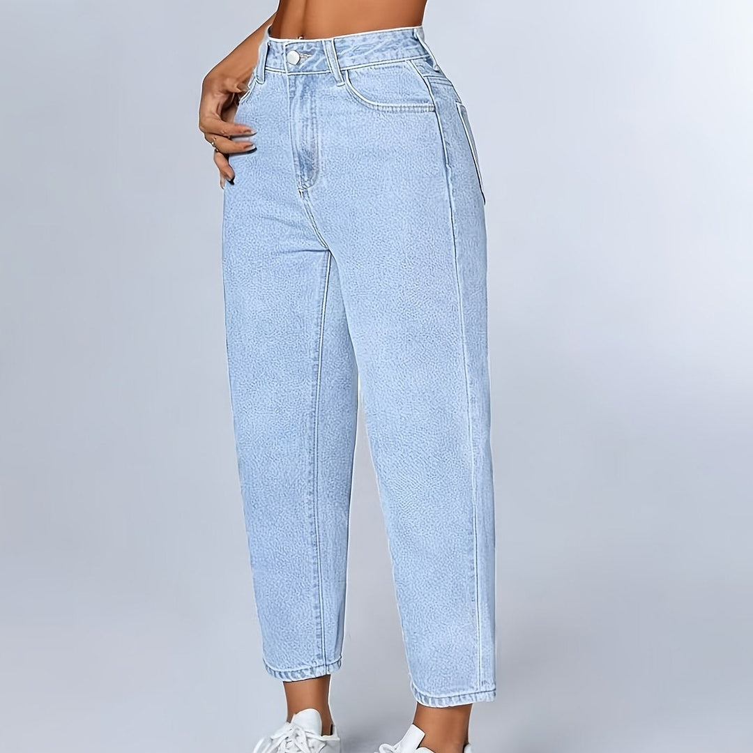 Classic light blue women's mom jeans, high-waisted, relaxed fit, and cuffed, ideal for casual wear.