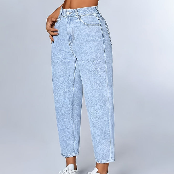Classic light blue women's mom jeans, high-waisted, relaxed fit, and cuffed, ideal for casual wear.