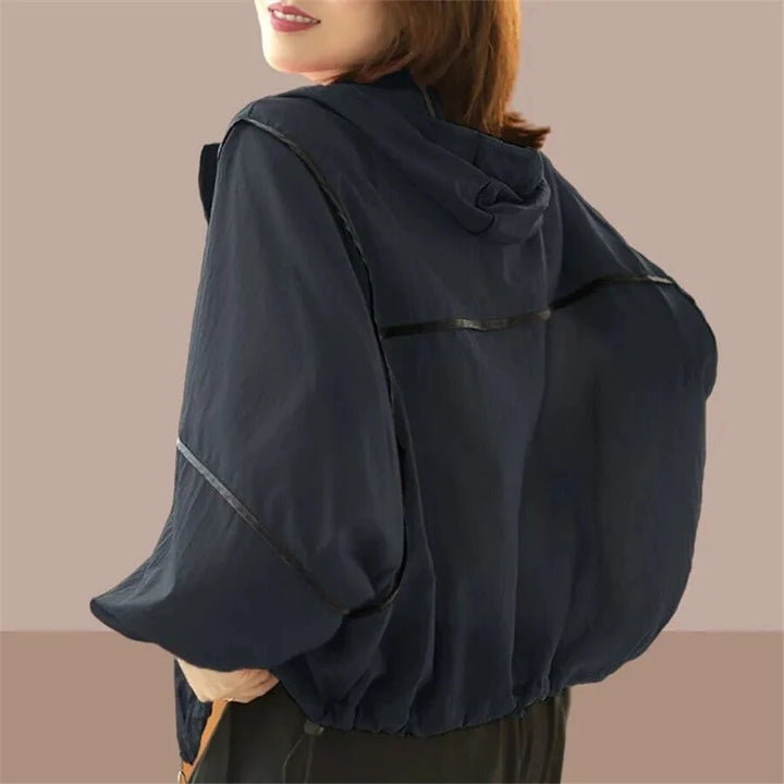 Comfortable ladies oversized hoodie jacket, a versatile lightweight outerwear piece for spring & summer fashion.