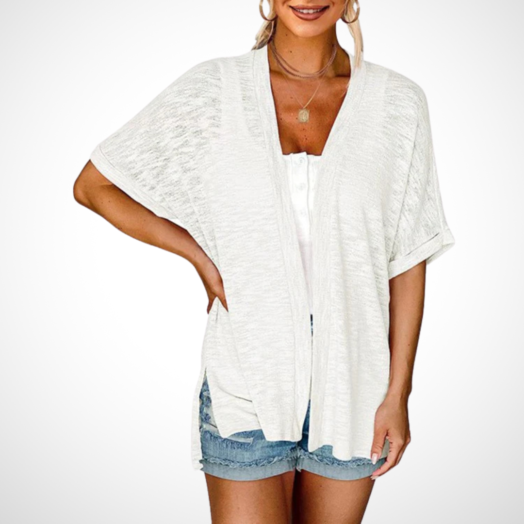 Versatile white women's flowing short sleeve cardigan, an elegant open front layering top for spring and summer.