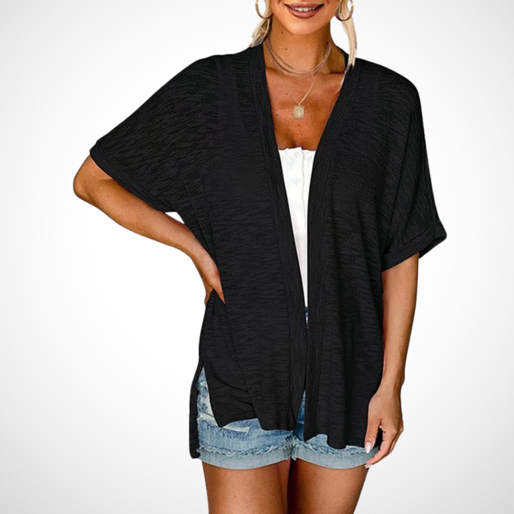 Elegant black lightweight short sleeve cardigan for women, a comfortable open front layer for spring & summer fashion.