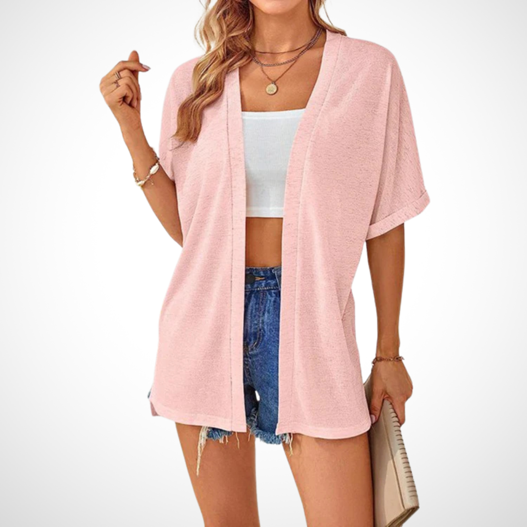 Pink women's short sleeve flowing cardigan, a lightweight open front layer ideal for warm weather and versatile styling.