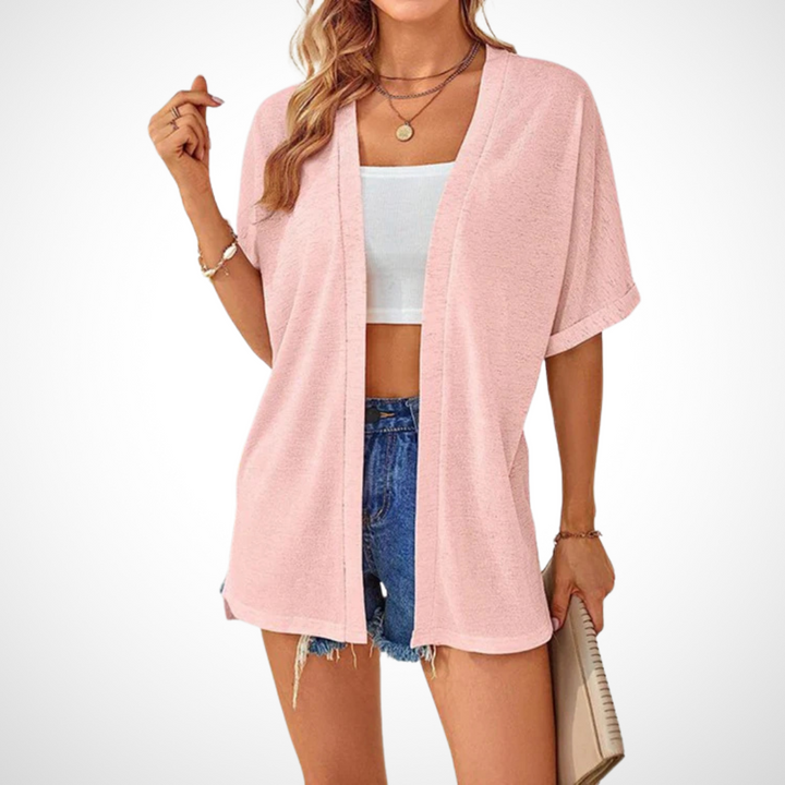 Pink women's short sleeve flowing cardigan, a lightweight open front layer ideal for warm weather and versatile styling.