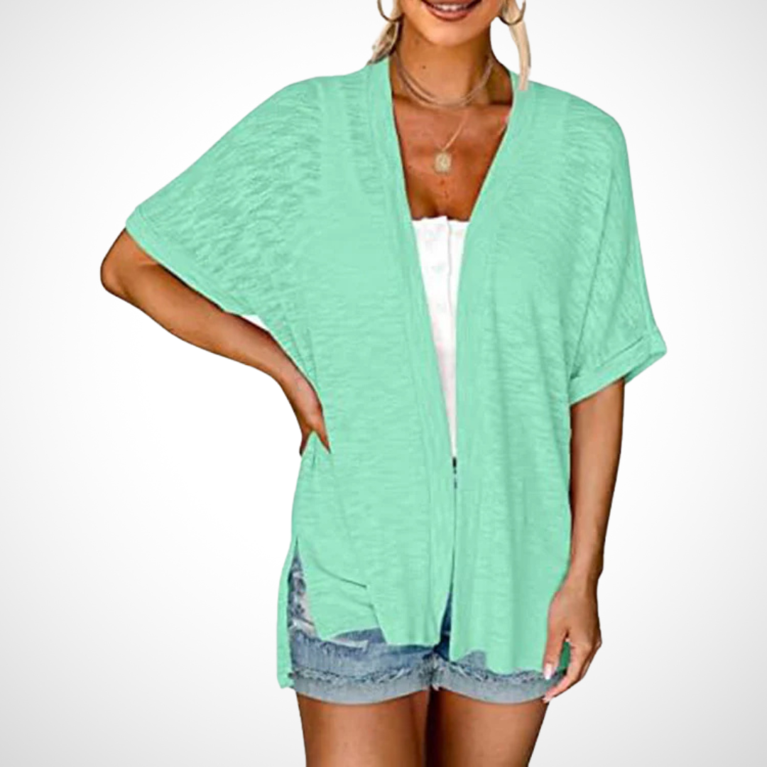 Women's flowing short sleeve open front cardigan in multiple colors, lightweight and elegant for spring & summer layering.