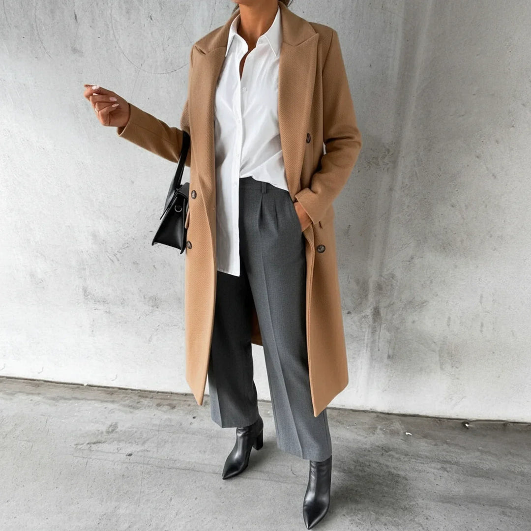 Classic women's long double-breasted coat, a sophisticated winter jacket for elegant fall fashion.