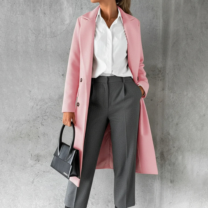Chic women's double-breasted long winter coat, elegant outerwear for a stylish and warm fall season.