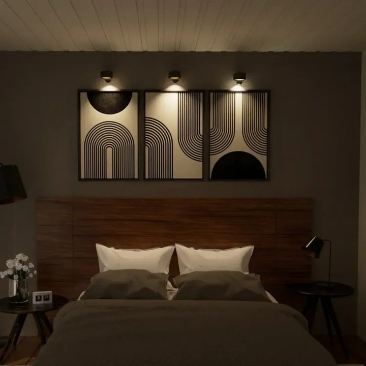 LumoFlex LED Wall Lamp, rechargeable and wireless, enhancing home ambiance elegantly.