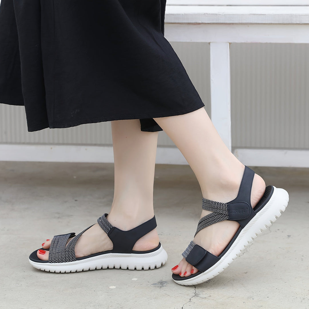 Lightweight women's summer footwear with arch support for active comfort.