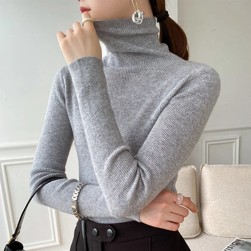 Premium women's cashmere turtleneck sweater, a luxurious soft knit for sophisticated winter elegance.