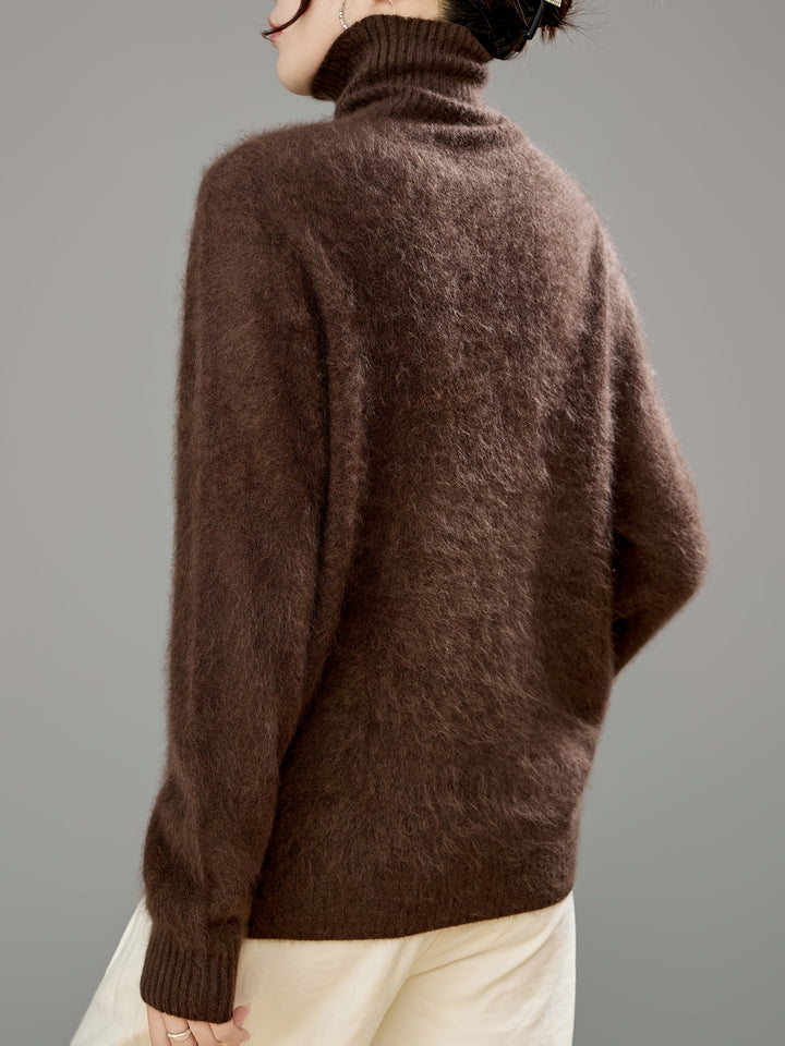 Incredibly warm women's turtleneck sweater. Luxurious soft knit, long sleeve, perfect for cold weather elegance.