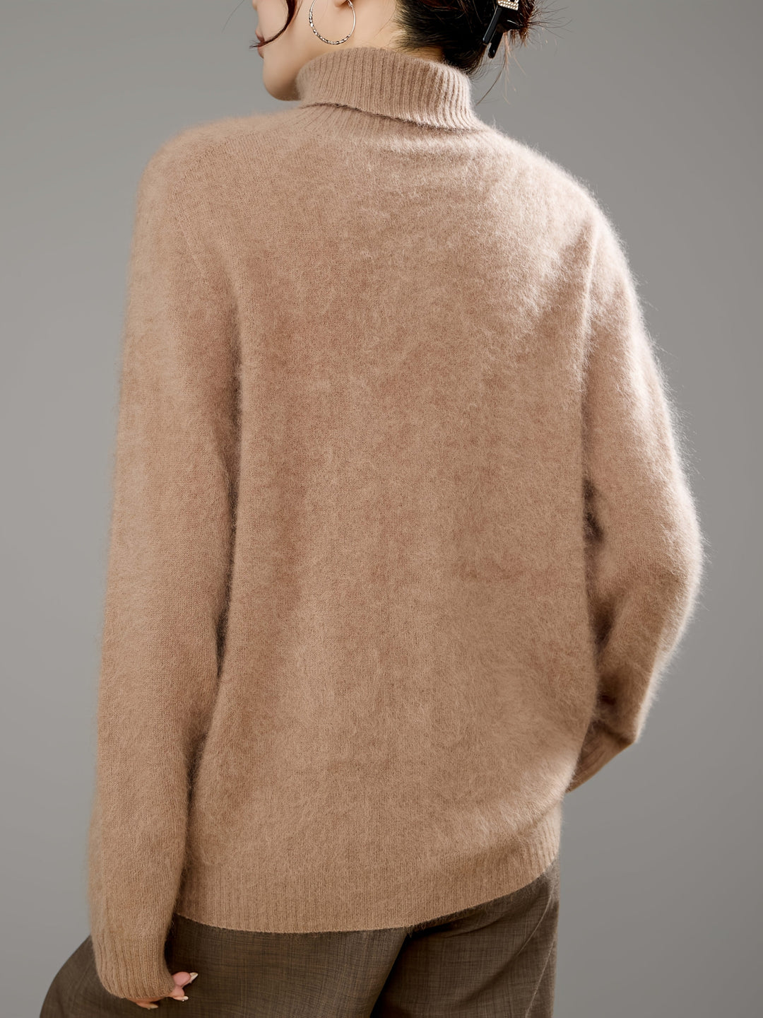 Elegant women's turtleneck sweater. Chic style, cozy wear, soft knit, warm for comfortable winter fashion.