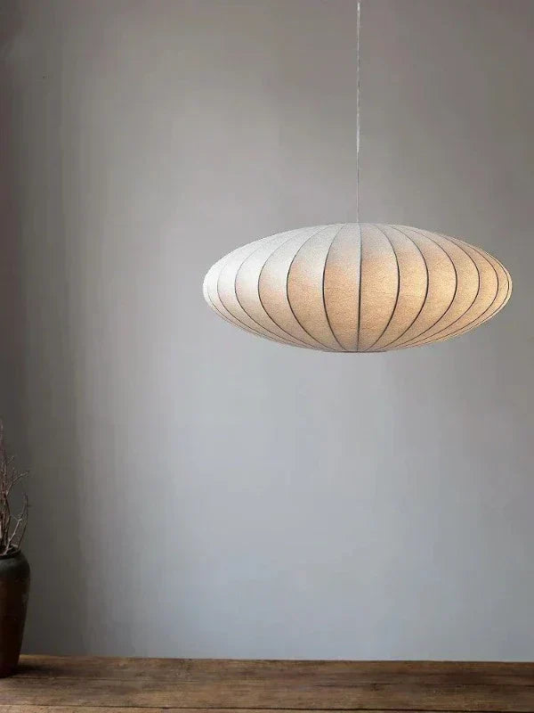 Luxury SilkCrown pendant lamp with shimmering crystals. Elegant lighting for modern homes.