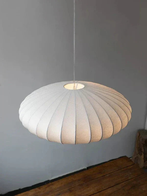 Opulent silk and crystal chandelier. Hand-crafted ceiling light for sophisticated home decor.