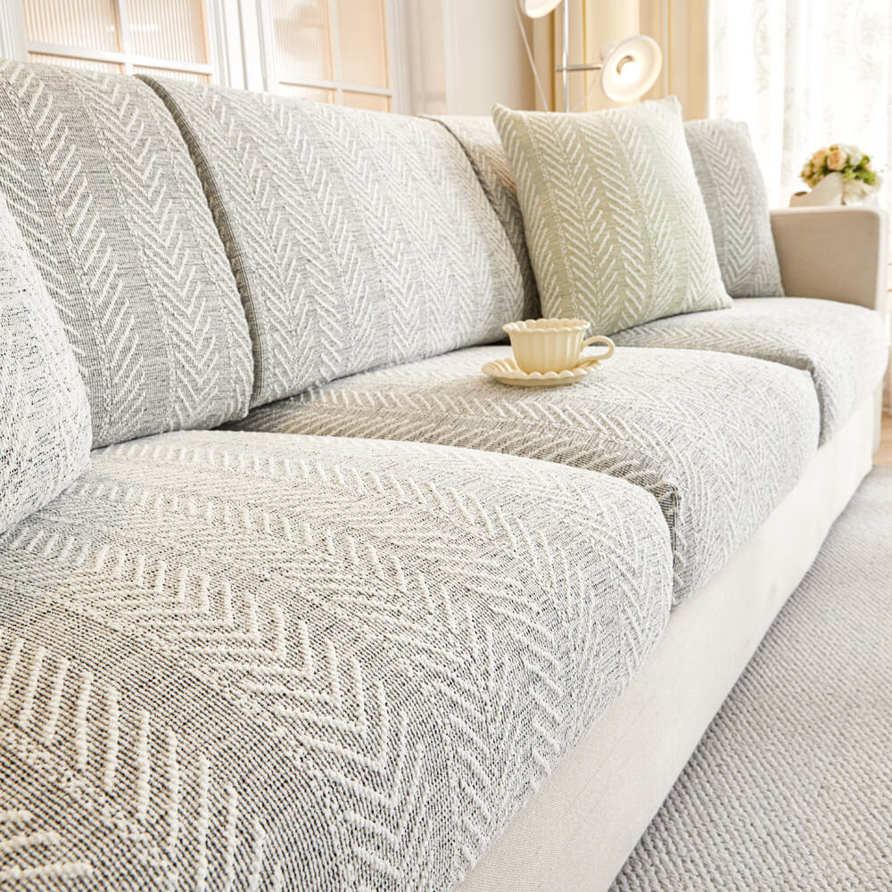 Durable waterproof couch cover. Pet-friendly non-slip sofa protector provides comfort and style for living room furniture.