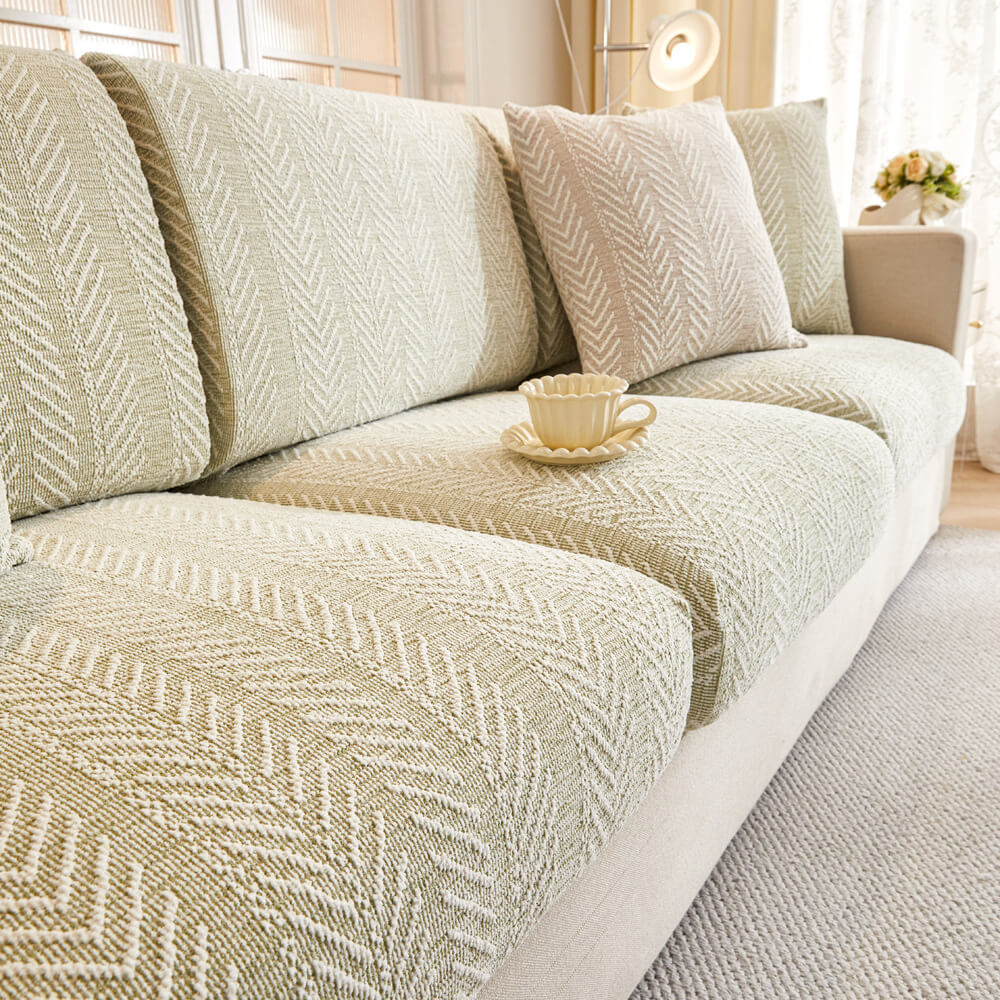Luxury chenille herringbone couch cover, a durable & waterproof sofa protector. Pet-friendly and washable for living rooms.